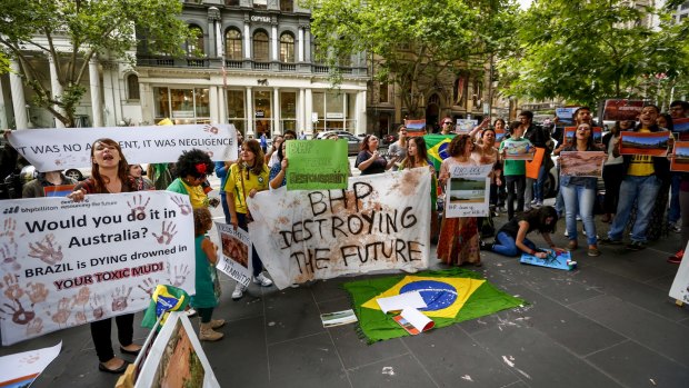 Brazilians protest outside BHP Billiton's headquarters in Melbourne on Friday.