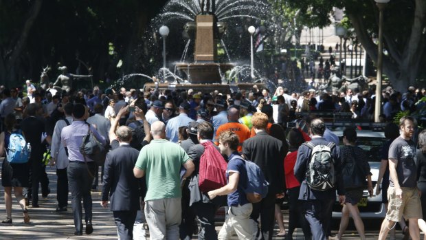 Crowds told to move on from Martin Place on Monday morning. 