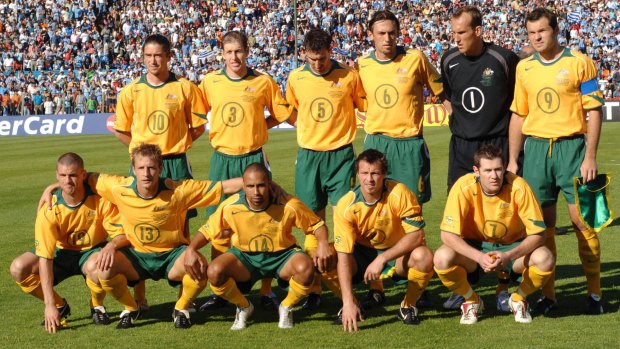 Archie Thompson (bottom, third from left) and the Socceroos team in the 2005 World Cup qualifier in Uruguay