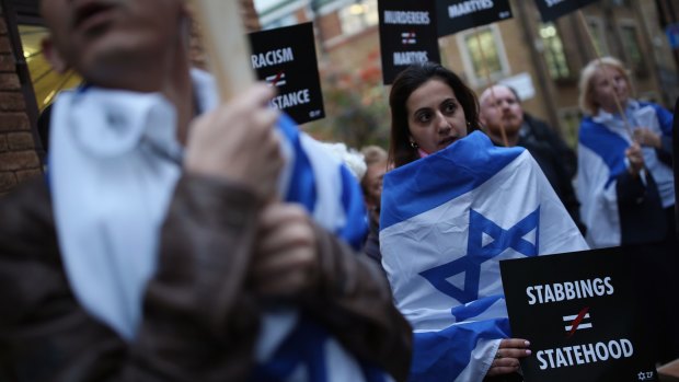 Israeli protesters gather outside the Palestinian Mission in London on Tuesday to protest at the recent stabbings.