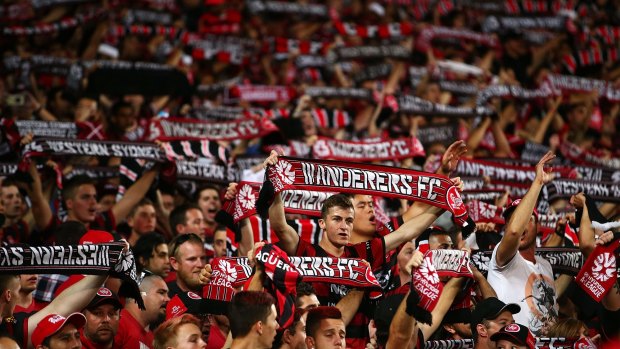 Show of support: Wanderers fans cheer on their team.
