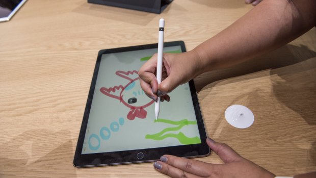 The Apple Pencil in use.