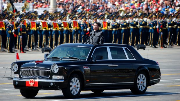 Chinese President Xi Jinping reviews the army during a parade last year commemorating the 70th anniversary of Japan's World War II surrender.