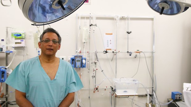 Associate Professor Kumud Dhital from the Victor Chang Cardiac Research Institute with the purpose-built liver transplant machine.