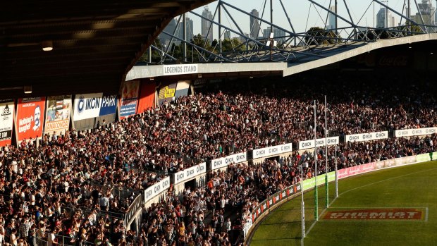 It's a sell-out: Punters cram in to watch Carlton thump Collingwood in the first AFLW match at Princes Park.
