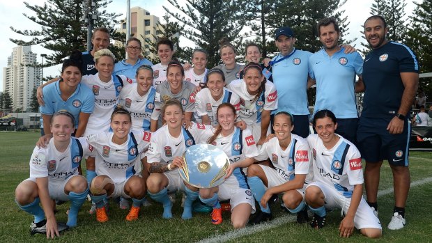 Melbourne City celebrate winning the W-League premier's plate after their win against Brisbane Roar on Monday. 