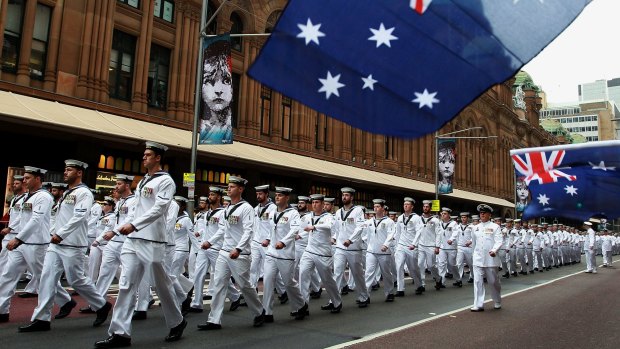 Members of the Royal Australian Navy march along George Street on Saturday.