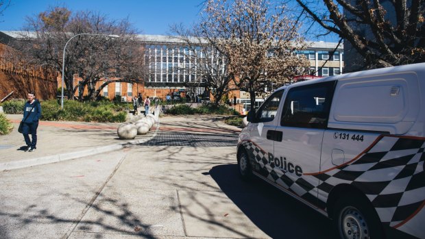 Scenes at the ANU after a man was arrested after allegedly attacking several people with a baseball bat in the Copland building.