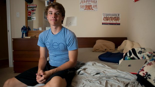 Alex Lee, 16, who became an internet sensation after a picture of him working at Target went viral, in his room in Frisco, Texas.