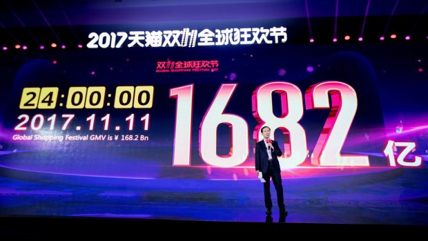 Daniel Zhang Yong, chief of China's largest e-commerce giant Alibaba Group, near a screen showing the amount of money consumers have spent after the conclusion of the Singles Day global online shopping festival in Shanghai, China,.