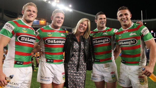 Family bond: Thomas Burgess, George Burgess, Julie Burgess, Luke Burgess and Sam Burgess pose after the round 25 NRL match between the Wests Tigers and the South Sydney Rabbitohs at Allianz Stadium on August 30, 2013.