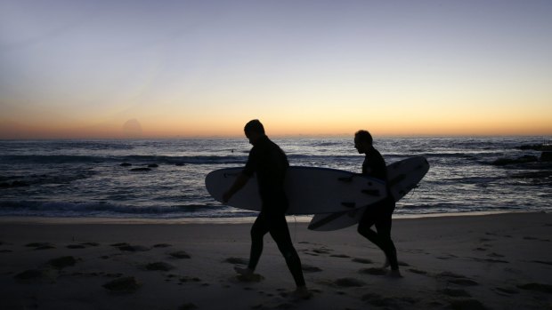 Surfers on Sydney's Bronte Beach last Saturday, which was sunny with warm temperatures.