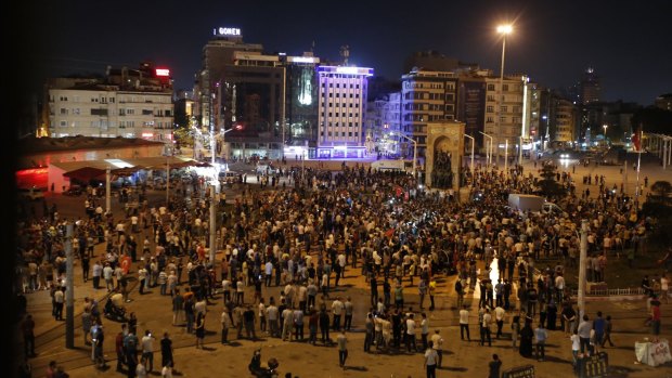 Supporters of Turkey's President Recep Tayyip Erdogan gather in Istanbul's Taksim square.