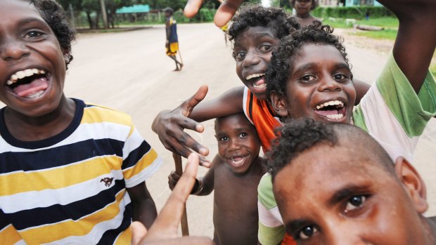 The Boys' in the main street of Aurukun at dusk.