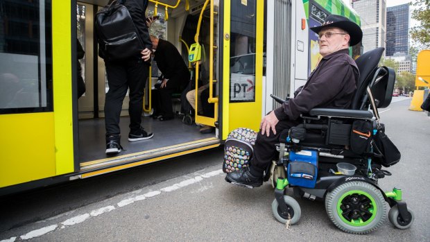 Brian Caccianiga cannot catch any of the low-floor trams that were introduced to William Street on May 1. 