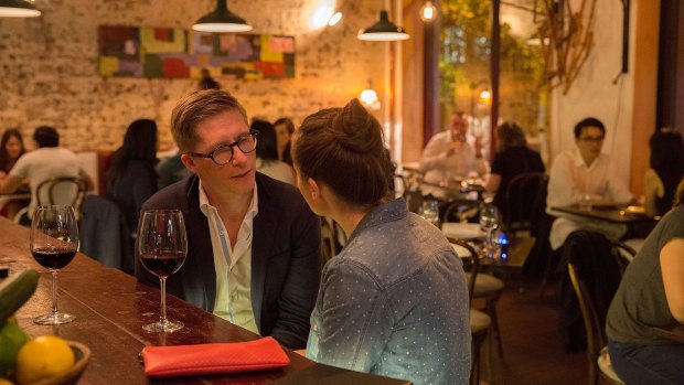 Seats at the bar allow diners to get the best view of the open kitchen.