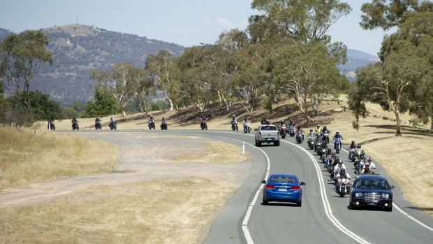 The 50-strong funeral procession travelled from Gowrie to Mitchell.