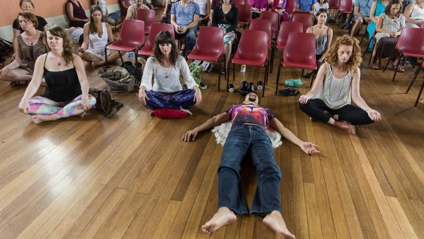 Switching on and off: the Australian Wellbeing Party launched with a group meditation.