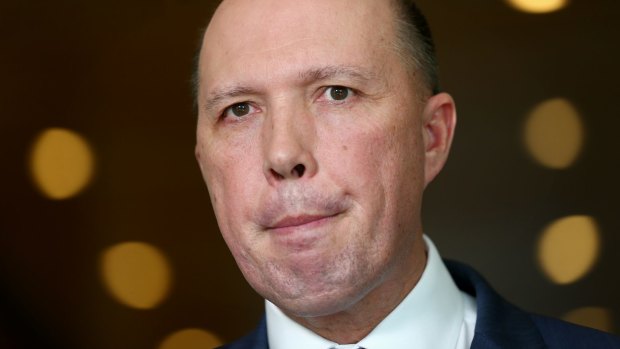 Minister for Immigration and Border Protection Peter Dutton during a doorstop interview in Canberra over the citizenship changes.