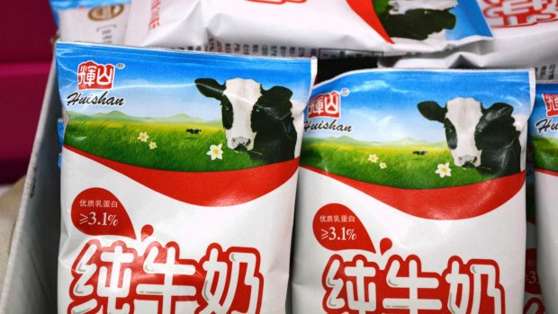 Bags of Huishan milk on a shelf in a grocery store in Shenyang. The fall in the dairy company's stock wiped billions off its market value, and decimated its chairman's fortunes.