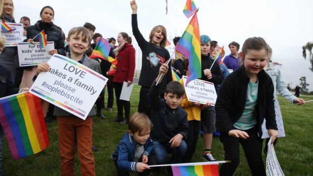 Rainbow Families opposed to a plebiscite on same sex marriage outside Parliament House last year.
