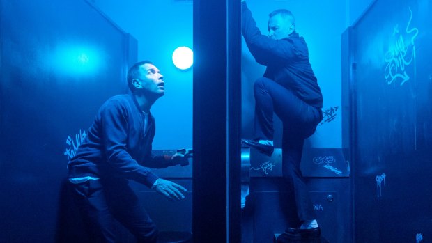Mark Renton (Ewan McGregor, left) and Begbie (Robert Carlyle) get up to mischief in a nightclub toilet in T2 Trainspotting. 