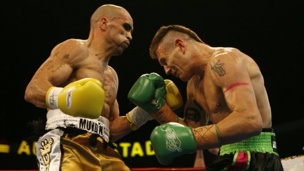 First clash: Anthony Mundine and Green fight in their super-middleweight eliminator in May 2006.