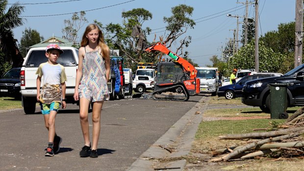 Neil Rox and sister Bree Rox walk along Tasman Street in Kurnell.