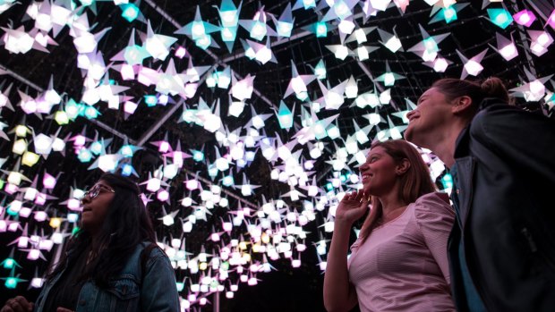 Visitor numbers and tweets influence the brilliance of the 1000 Cranes installation.