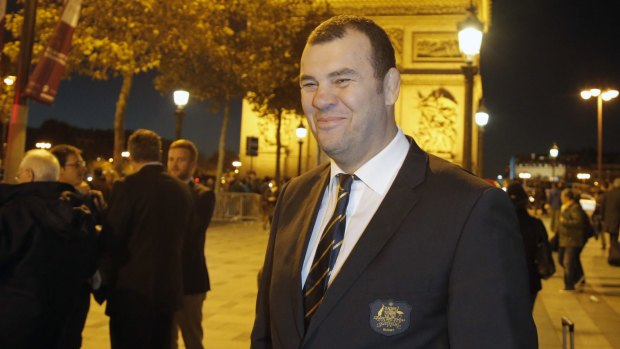 Warm welcome: Michael Cheika, pictured in front of the Arc de Triomphe this week.
