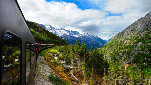 A vintage train rolls out of Skagway.