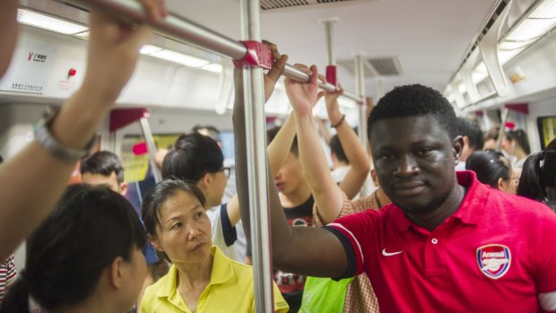 A man from Sierra Leone travels the subway in Guangzhou.