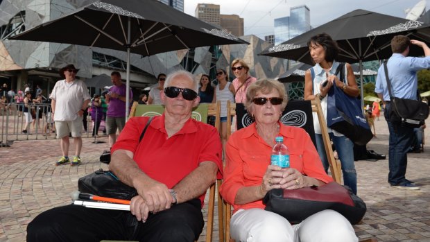 Val and Mary Simpson from Mernda waiting at Federation Square for the Bourke Street Vigil.