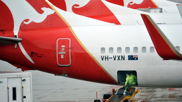 Flying high: Qantas has forecast a pretax profit of up to $350 million in the first half of this financial year.