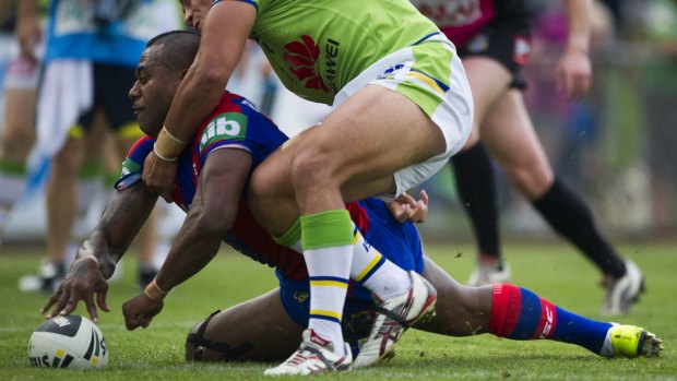 Trial blazer: Newcastle Knights winger Akuila Uate scores a try against Canberra in the pre-season.