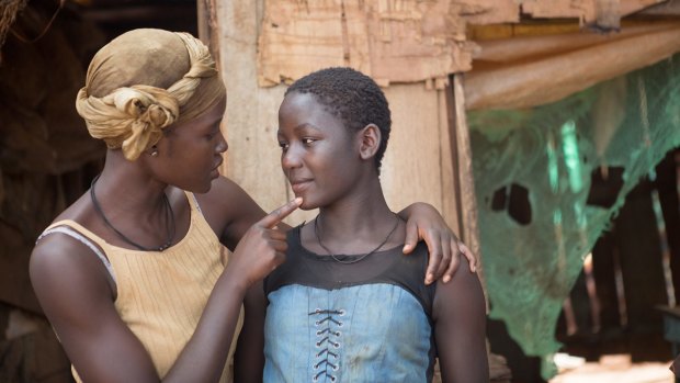 At odds: Lupita Nyong'o plays the mother of Phiona Mutesi (Madina Nalwanga). The two struggle to reconcile the realities of life with the urge to follow dreams.