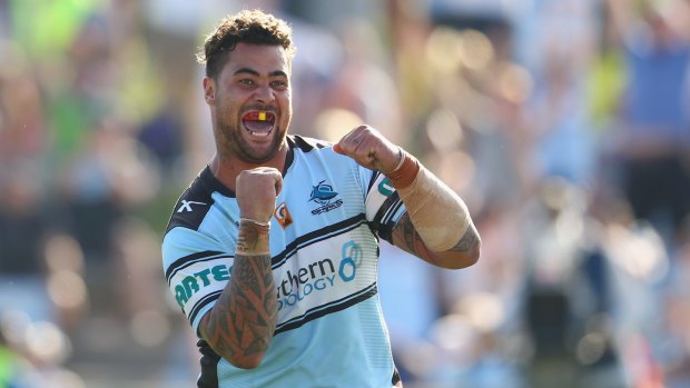 Dancing into the top four: Andrew Fifita celebrates scoring a try against the Titans.