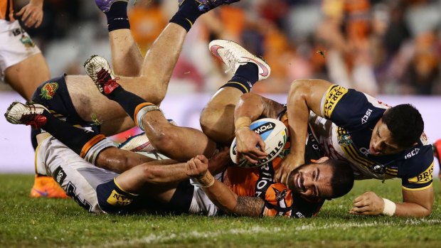 Down time: Saturday night's clash between Wests Tigers and the Cowboys was a dour affair.