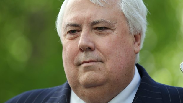Clive Palmer's company Queensland Nickel donated almost $290,000 to his troubled political party just two weeks before sacking 237 workers.