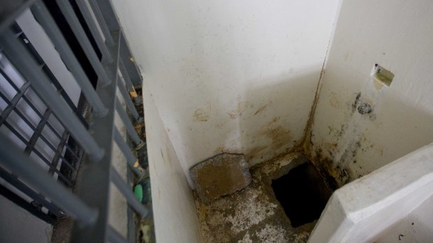 The shower area where authorities say drug lord Guzman, slipped into a tunnel to escape from the Altiplano maximum security prison in July 2015.