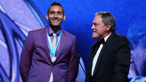 Nick Kyrgios on stage with John Newcombe at Crown Palladium in Melbourne after receiving the 2014 Newcombe Medal.