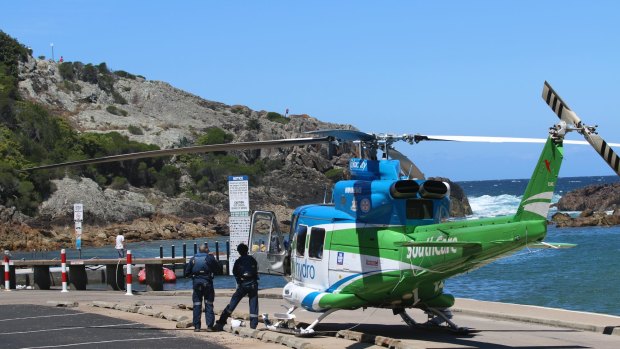 Emergency crews were called to Tathra after a group of Canberra fishermen were swept off the rocks.