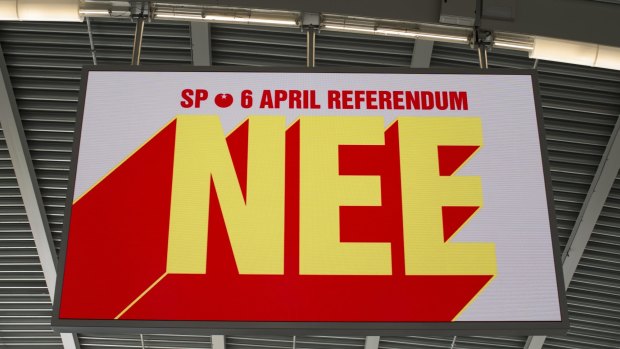 A screen in Utrecht displays the word "Nee" or "No" on a Dutch Socialist Party campaign poster for the referendum.