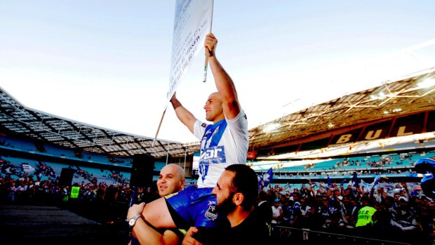 Club legend: Bulldogs stalwart Hazem El Masri is chaired off the field in his farewell game at ANZ Stadium in 2009.