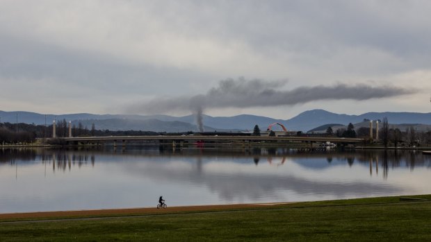 The fire at the Canberra National Zoo and Aquarium on Sunday sent a plume of smoke into the sky.

