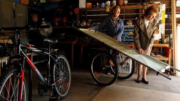 Pioneering: Joyce Conolly inspects one of the bicycle ambulances made by Garry Greinke for use in Myanmar. 
