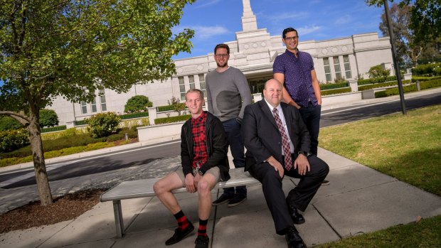 Church elder Robert Dudfield, front, with Lincoln Krieger, left, Zac Tennant and Chris Bryers at a temple in Wantirna South.