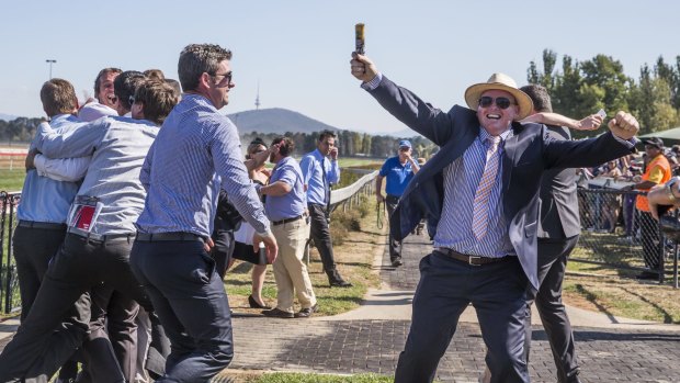 Celebrations as Rom Baro wins the Canberra Guineas from Mr Bogart.