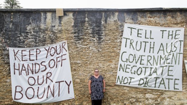 Norfolk Island resident Kim Edward at a protest camp at the site of the axed Legislative Assembly.