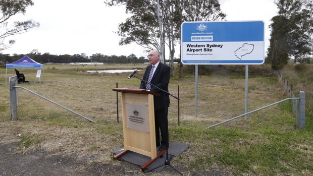 Deputy Prime Minister Warren Truss marks the official declaration of the Badgerys Creek airport site. 